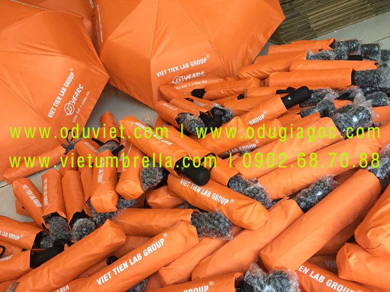 xưởng sản xuất ô dù cầm tay in logo quảng cáo